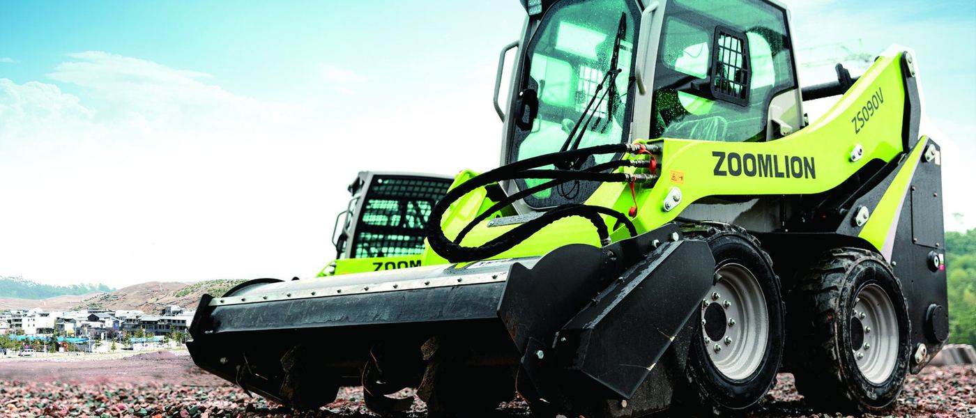 Zoomlion skid steer running a mulcher attachment